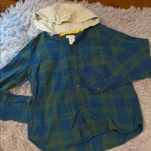 Like new!  Boys plaid shirt with back graphics